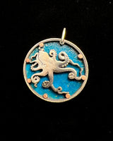 Tuvalu - Octopus Cut Coin Pendant with Blue Background