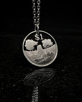 Zimbabwe - National Monument Cut Coin Pendant