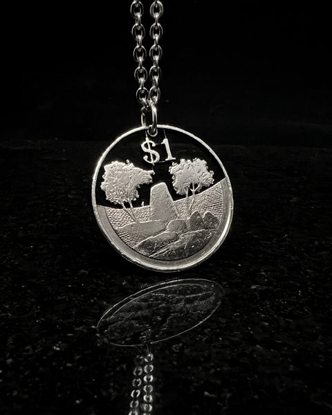 Zimbabwe - National Monument Cut Coin Pendant