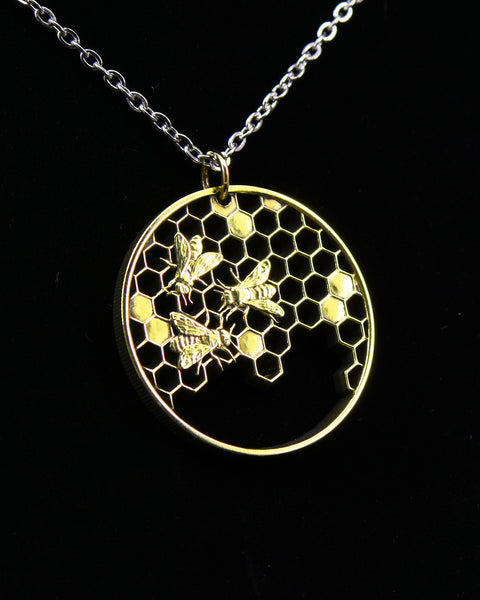 Slovakia - Cut Coin Pendant with Bees on a Honeycomb