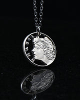 Brazil - Cut Coin Pendant with Lady Liberty (with words)