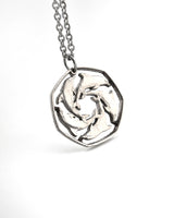 Gibraltar - Cut Coin Pendant with Dolphins