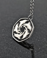 Gibraltar - Cut Coin Pendant with Dolphins