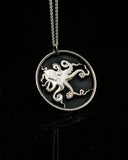 Tuvalu - Octopus Cut Coin Pendant with Black Background