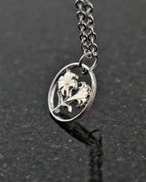 Bermuda - Lily Cut Coin Pendant